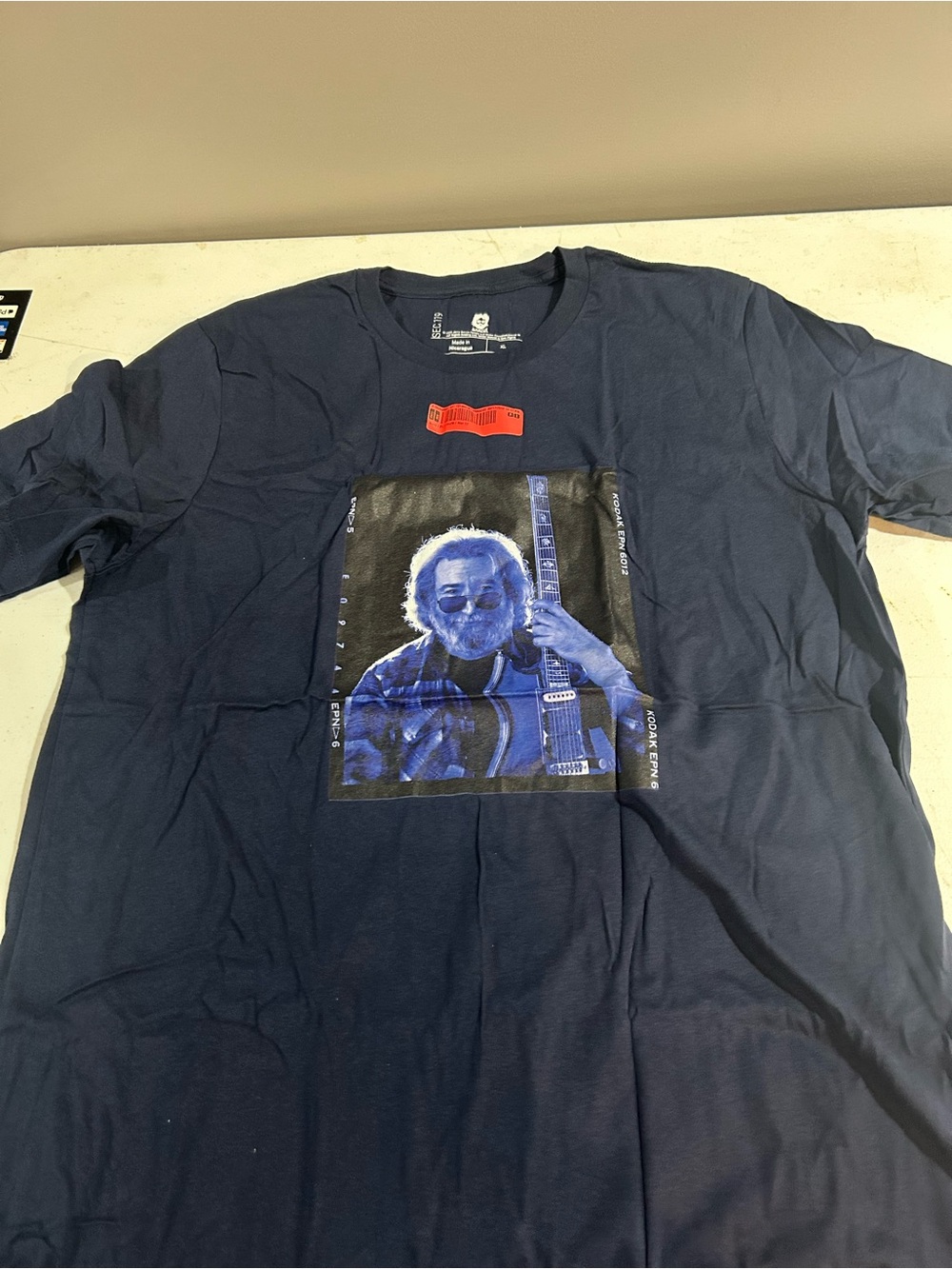 Men's Navy Graphic Short-Sleeve Tee with Music Print. Jerry Garcia